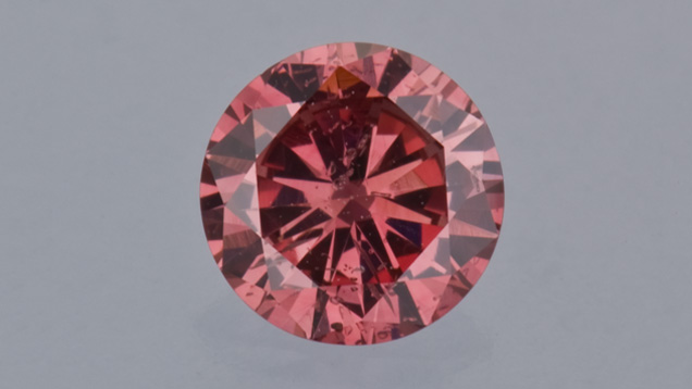 0.51 ct round cut reddish-pink diamond from the Aurora Butterfly of Peace.
